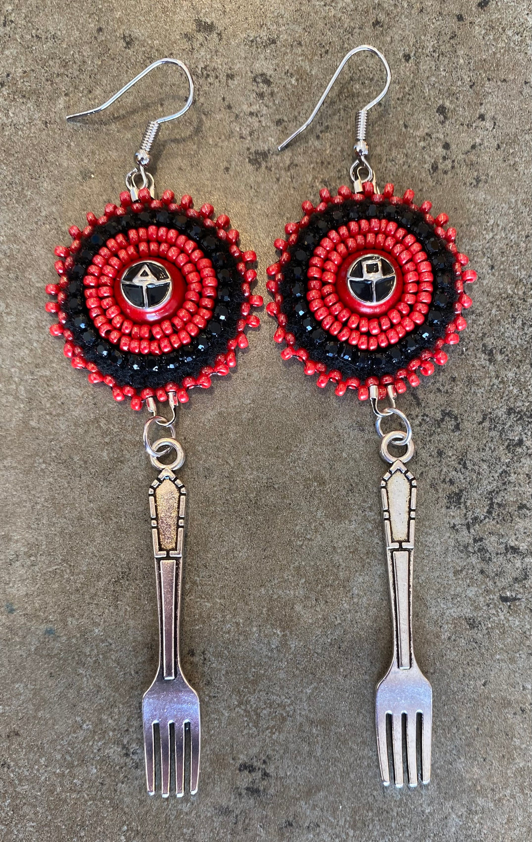 Squid Game Guard symbols with forks
