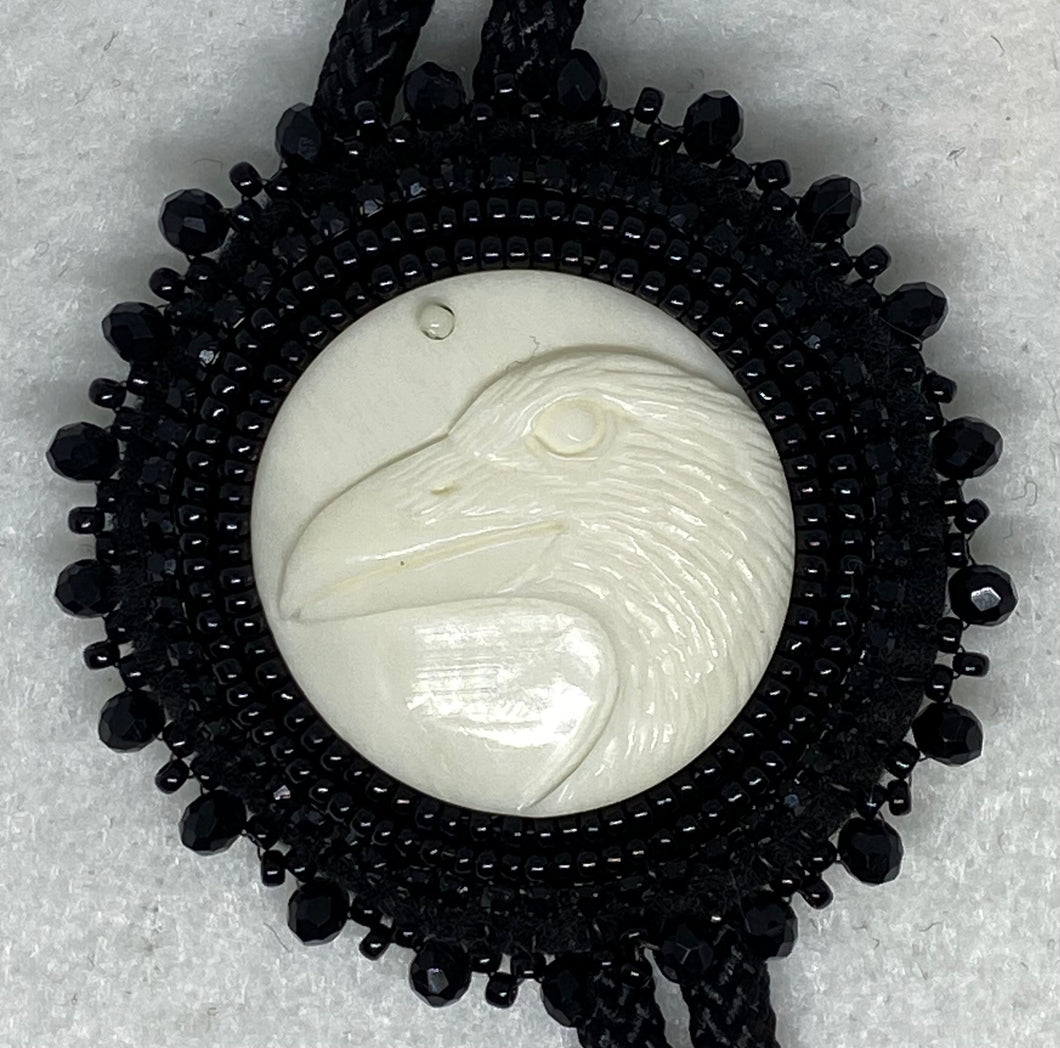 White Raven bone bolo tie