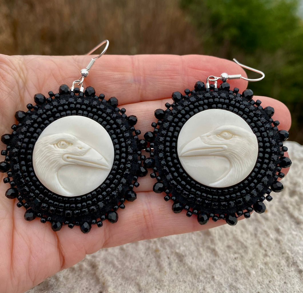 White Raven carved bone